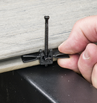 inserting clip into board